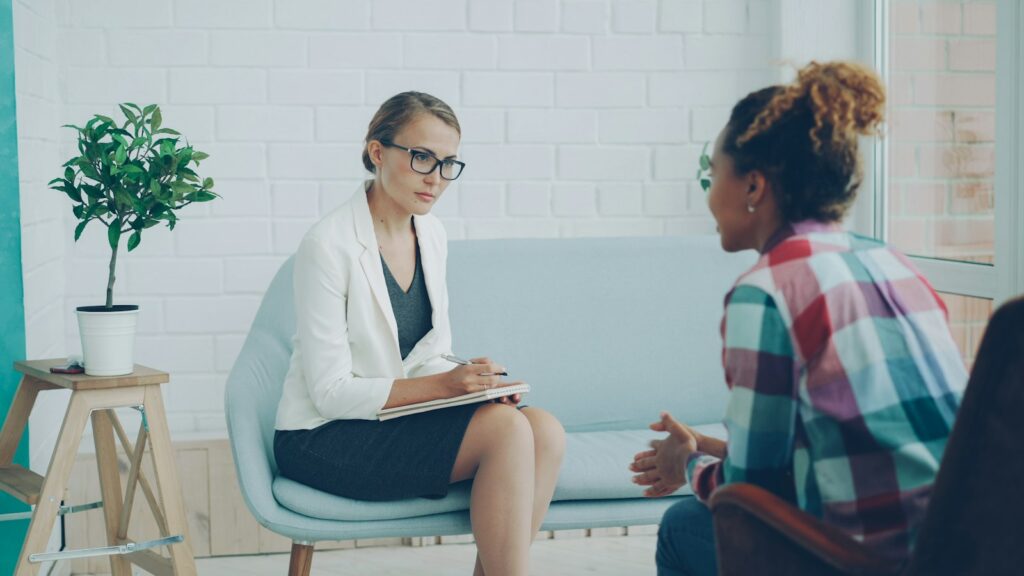 Therapist in a session with a client